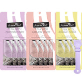 Fussie Cat packaging with tuna puree treats, ready for easy serving and on-the-go snacking.