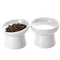 Generic elevated cat bowl with tilted-water design reduces neck strain.