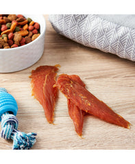 Generic Golden Rewards chicken jerky texture close-up highlights tender chew.