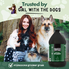 Pouring Nasty Critter shampoo from bottle during a dog bath.