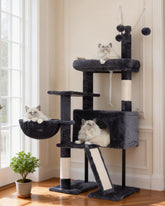 Gitelsnour cat tree top platform with plush balls for interactive play.