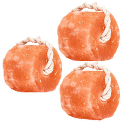 Glowyn Pink Himalayan salt lick pack on rope for livestock hydration and grazing.