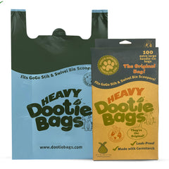Gogo Stik heavy-duty dootie bags in a dispensing box for quick waste disposal.