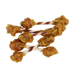 GOOD 'N' FUN Triple Flavor Double Pops with Chicken dumbbell-shaped treats held in hand.