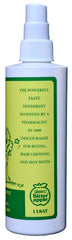 Applying Grannick's Bitter Apple Spray on a dog's coat to deter licking