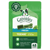 Greenies Teenie mint-flavored dental treats pack-12oz for fresh breath in small dogs.