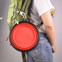 Guardians foldable dog water dish outdoors, compact for packing.