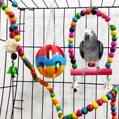 Hanging bell toy from Hamiledyi adds bright sound and chew-friendly wood