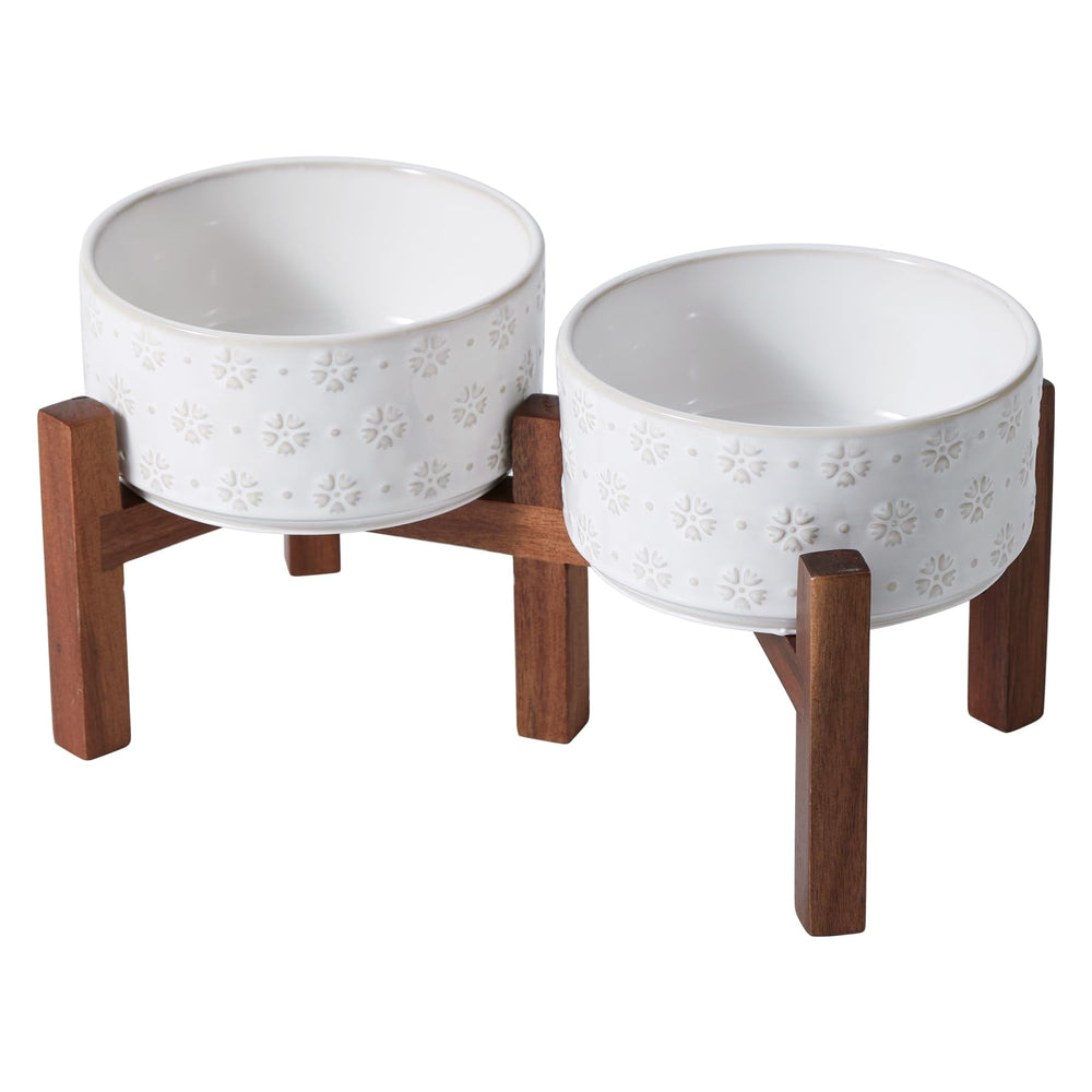 Havniva elevated ceramic dog bowl with acacia wood stand for comfortable eating posture.