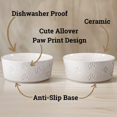 HB Design Co paw-imprinted bowls add decorative charm to feeding area.