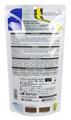 Hikari Bio-Gold Mini floating pellets in water for intake monitoring.
