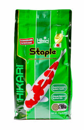 Hikari Staple Koi Food mini pellets in bag for daily pond feeding.