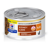 Hill's k/d kidney care chicken and vegetable stew can with cat nearby enjoying a meal