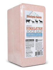 Himalayan Secrets pink salt block for deer licking in pasture, supports steady mineral intake.