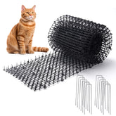Hmyomina 13ft scat mat on a garden bed deterring cats while protecting plants