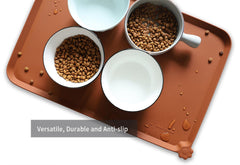 Hoki Found dishwasher-safe mat in caramel helps quick cleanup and travel use.