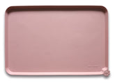Hoki Found large non-slip mat with raised edge prevents spills.