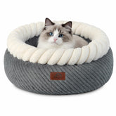 Hollypet round bed nest design creates secure, curled-up comfort for indoor cats.