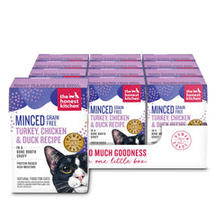 The Honest Kitchen minced turkey-chicken-duck cat food in bone broth gravy, a flavorful complete meal.