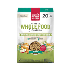 The Honest Kitchen puppy grain-free chicken dry dog food bag shows grain-free puppy nutrition.