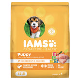 IAMS Proactive Health puppy kibble in a bowl promoting balanced meals for puppies.