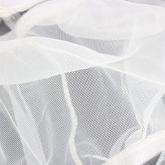Bird cage with netting cover installed for dust protection and cleaner surroundings.