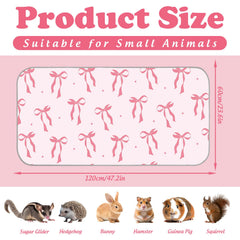 JarThenaAMCS pink bow design on washable pet pad for versatile use.