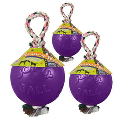 Close-up texture of the Jolly Pets Romp-n-Roll rope fibers and ball for durable grip.