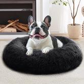 JOLLYVOGUE Calming Donut Bed 31in helps anxious dogs burrow and feel secure.