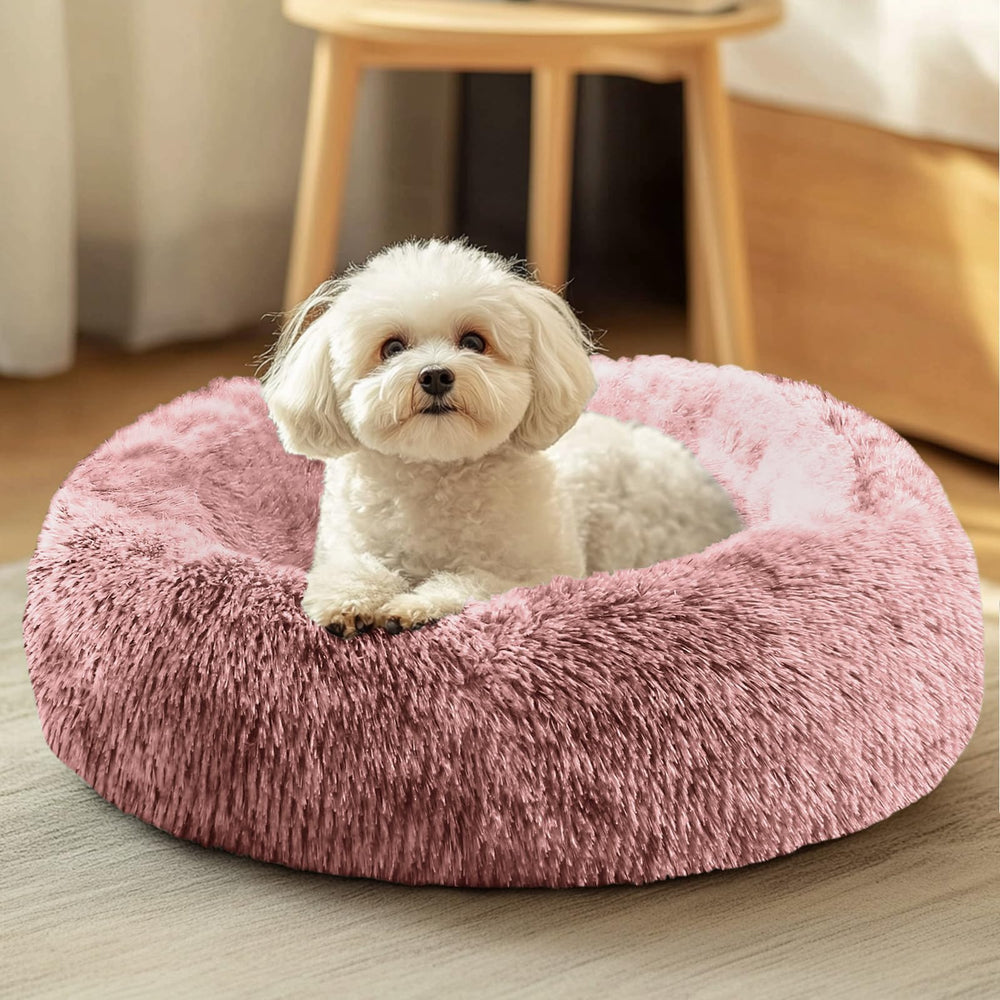 JOLLYVOGUE Donut Bed in soft plush fabric offers a warm, inviting rest.