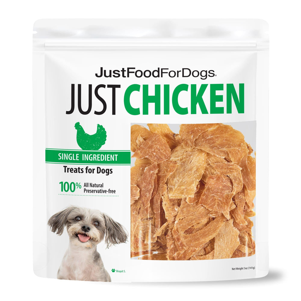 JustFoodForDogs chicken breast treats in hand, oven-baked texture ideal for training rewards.