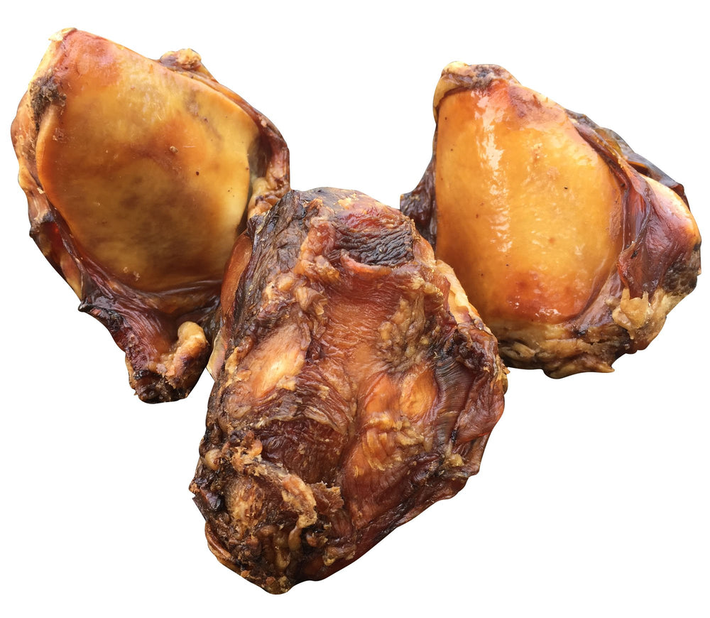 K9 Connoisseur USA-made beef knee cap bones for durable, long-lasting chewing.