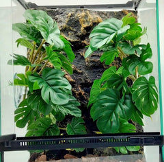 KERUIDENG Reptile Plants hanging monstera leaves add natural terrarium decor.
