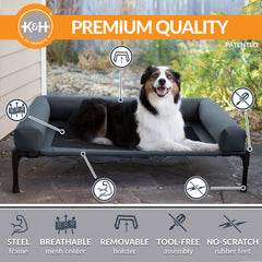 K&H Bolster Dog Cot outdoors in a yard for lounging