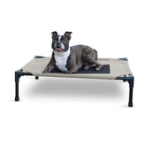 K&H Pet Products outdoor elevated dog cot with breathable mesh for cooling comfort.