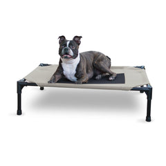 K&H Pet Products outdoor elevated dog cot with breathable mesh for cooling comfort.