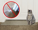KittySmart carpet scratch stopper in doorway protects carpets from feline scratching.
