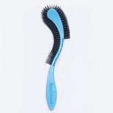 KittyWand cat brush blue ergonomic design enhances gentle grooming.