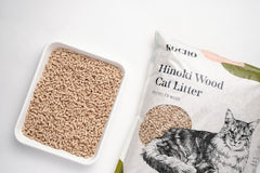 KOCHO Hinoki litter pellets close-up highlighting lightweight form for easy lifting.
