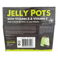 Komodo Jelly Pots inside a live enclosure demonstrating easy feeding setup