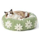 LE SURE donut bed top view shows plush comfort for pets