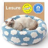 LE SURE donut cat bed in bow pattern offers cozy lounging for indoor cats