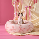LE SURE donut cat bed in pink taffy for cozy indoor naps