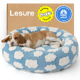 LE SURE donut bed top view in blue offers cozy round comfort and secure resting space.