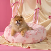 LE SURE Shown on TV donut bed in pink with plush round design for cozy naps.