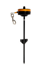 Lixit bracket mount dog tie-out on a deck provides secure outdoor tethering for small dogs.