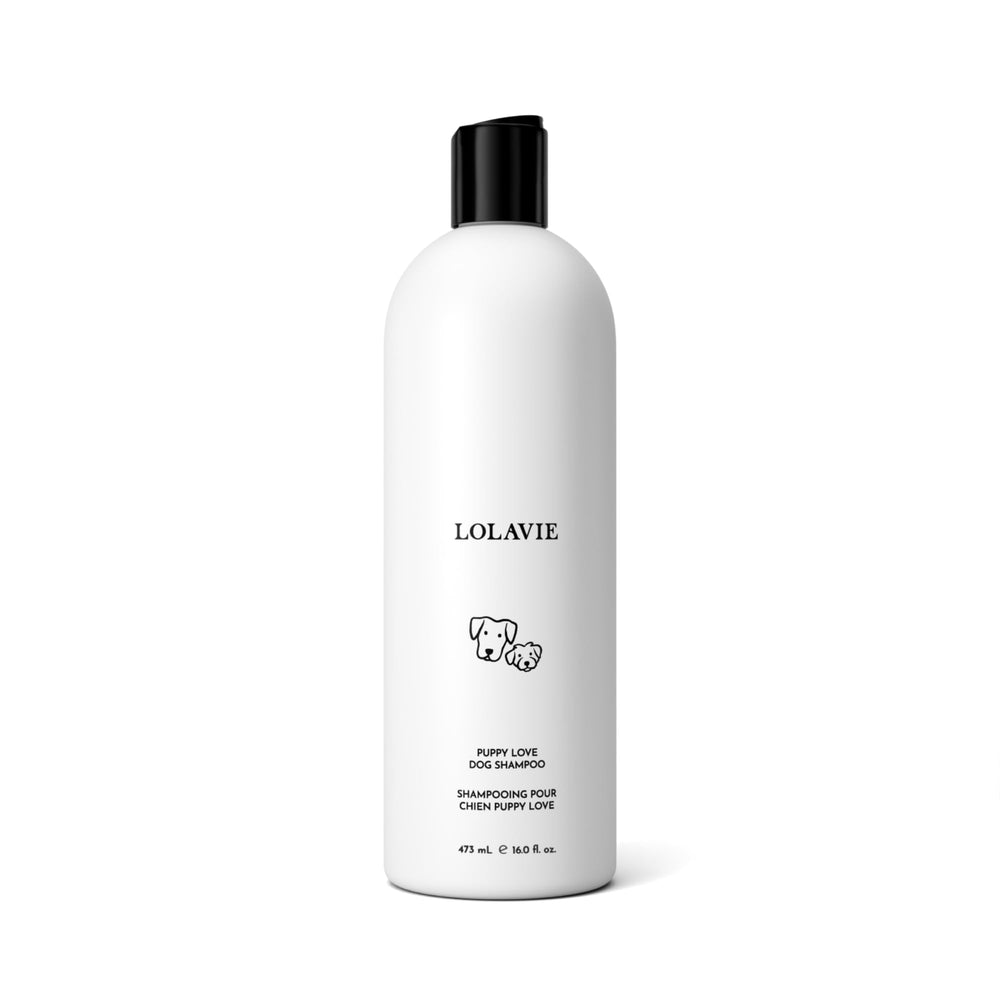 LolaVie Puppy Love Shampoo bottle close-up showing gentle, pH-balanced wash for sensitive puppy skin.