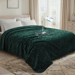 LOOBANI forest-green waterproof blanket front jacquard protects furniture from spills.