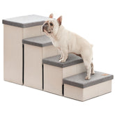 Love's cabin dog stairs against a bed for easy access and pet comfort.