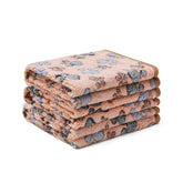 Luciphia blanket with paw print design for a cozy pet spot.